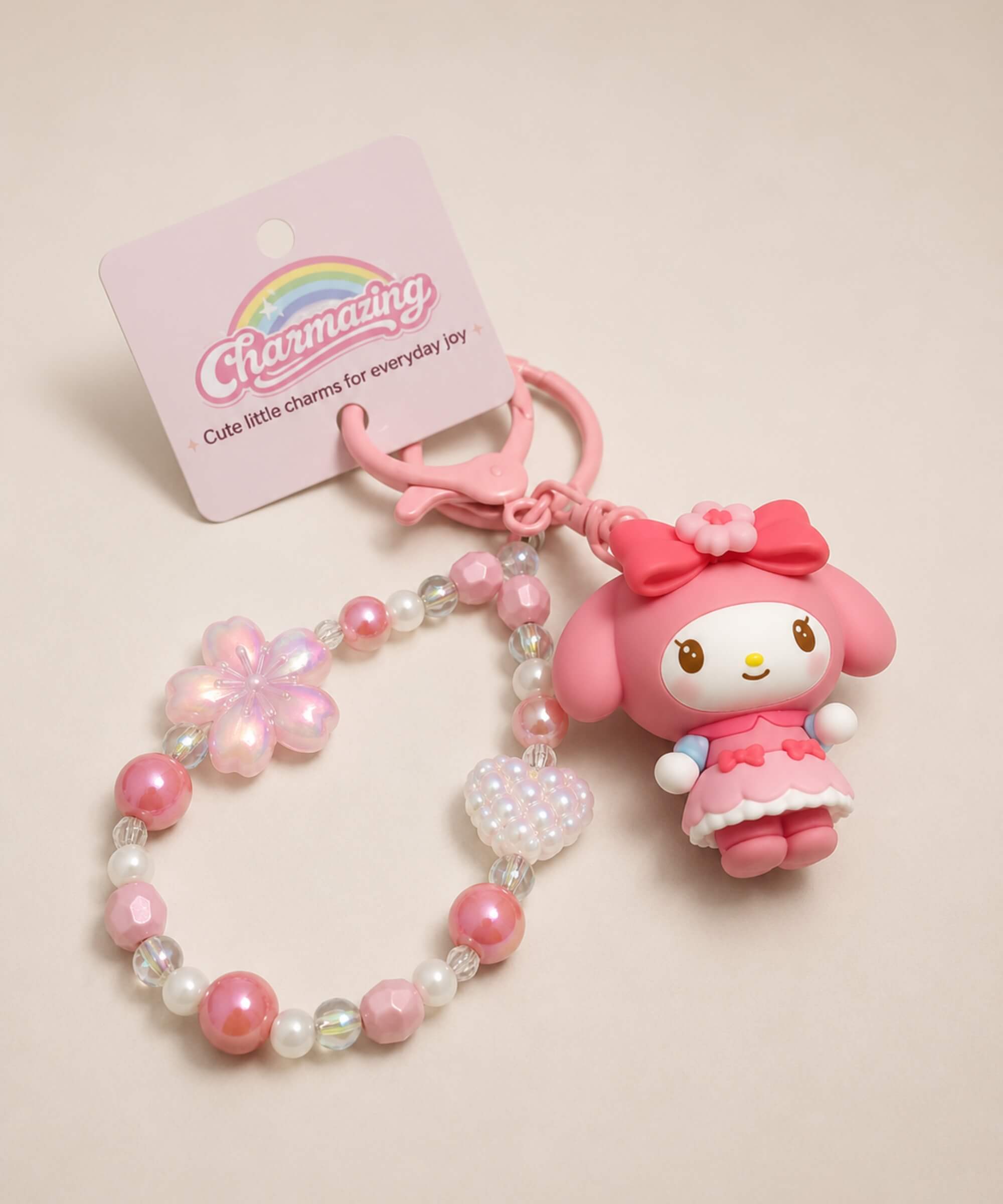 Pink My Melody princess Sanrio beaded keychain with pink beads, flower charm and bow detail