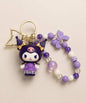 Purple Kuromi magic Sanrio beaded keychain with purple beads, bow detail and gold-tone hardware