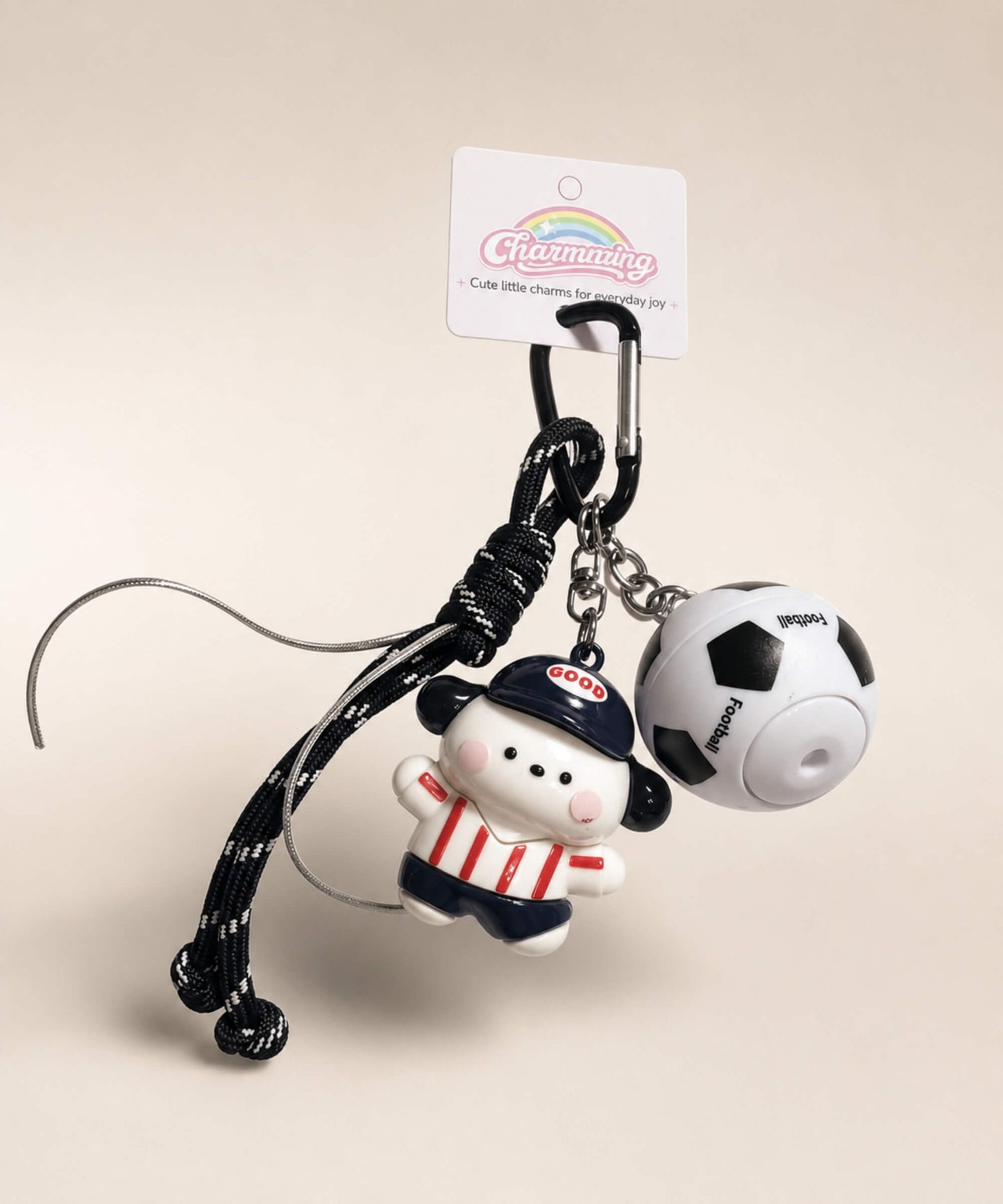 Red stripe dog soccer ball spinner keychain with rotating football detail and black rope-style strap