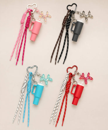 Tumbler cup rope keychains in assorted colours with heart carabiners, rope straps and balloon dog charms