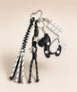 Black unicorn PU leather bag charm keychain with white wing, star charms and white chocolate charm.