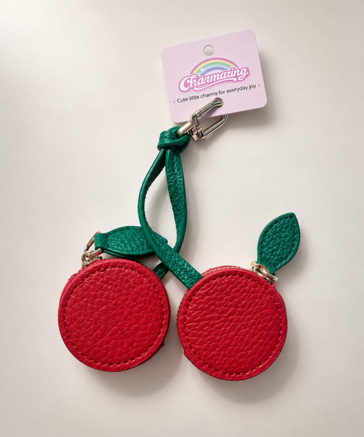 Cherry fruit coin purse keychain with two red PU leather-style pouches, green stems and leaf details
