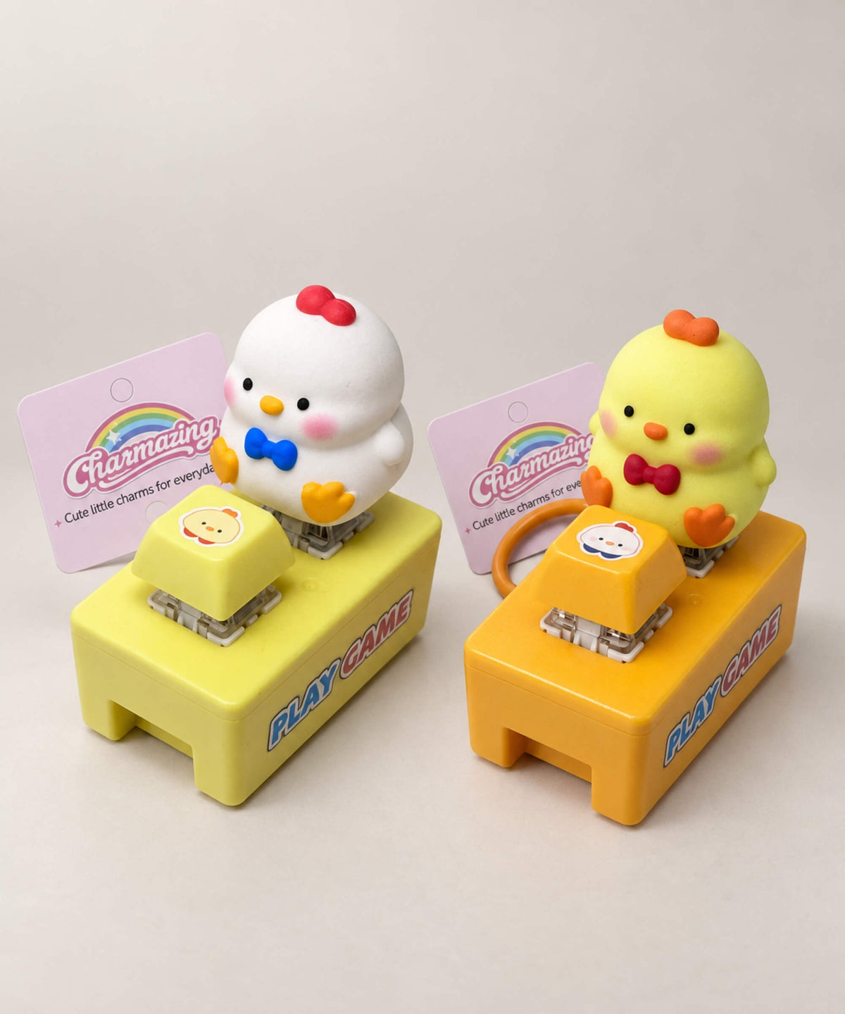 White and yellow chick sound and light button keychain variants