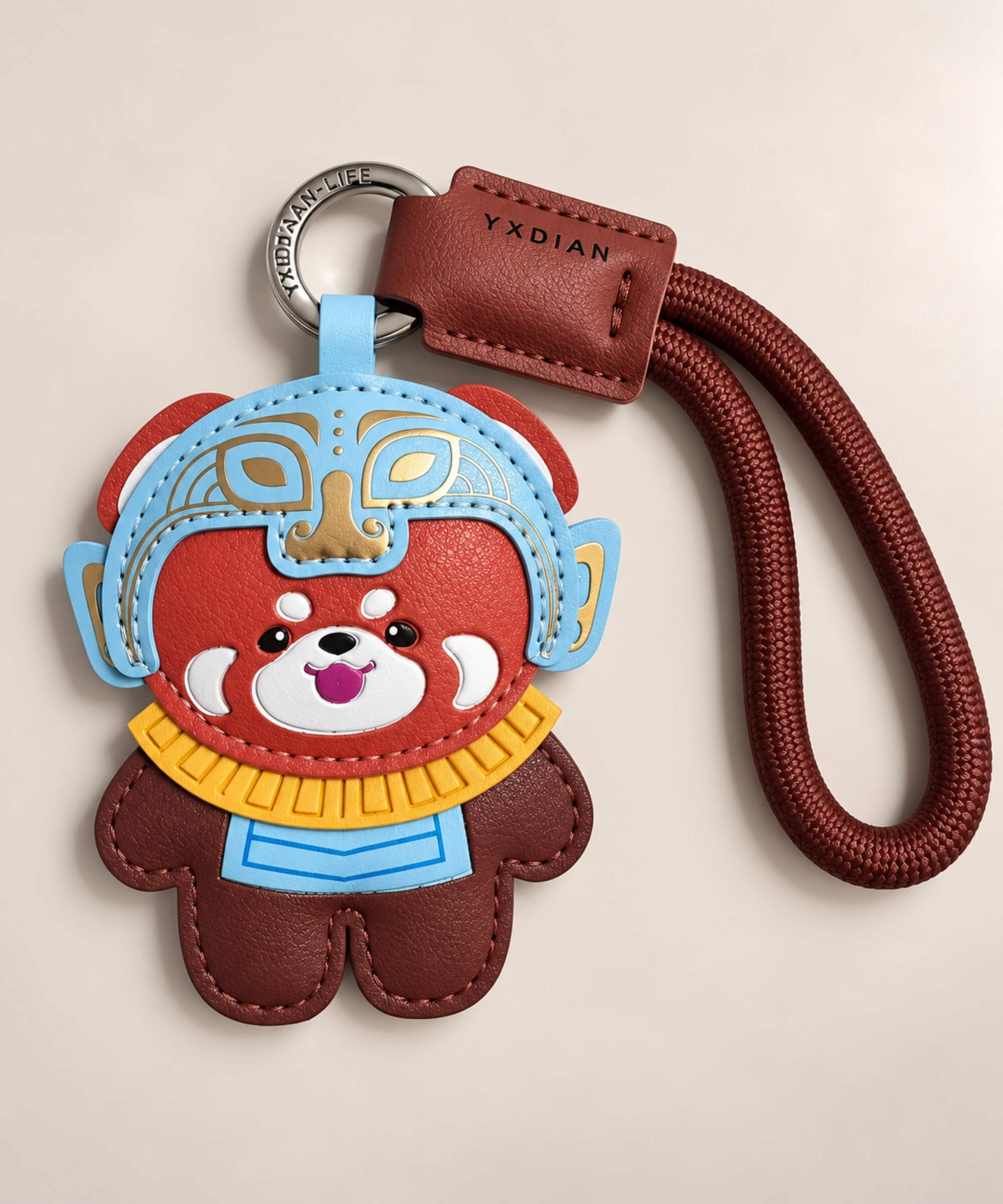 Red Panda Chinese opera-inspired PU leather bag charm keychain with blue, gold and brown details