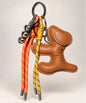 Brown dog PU leather bag charm keychain with orange and yellow rope cords and hanging charms