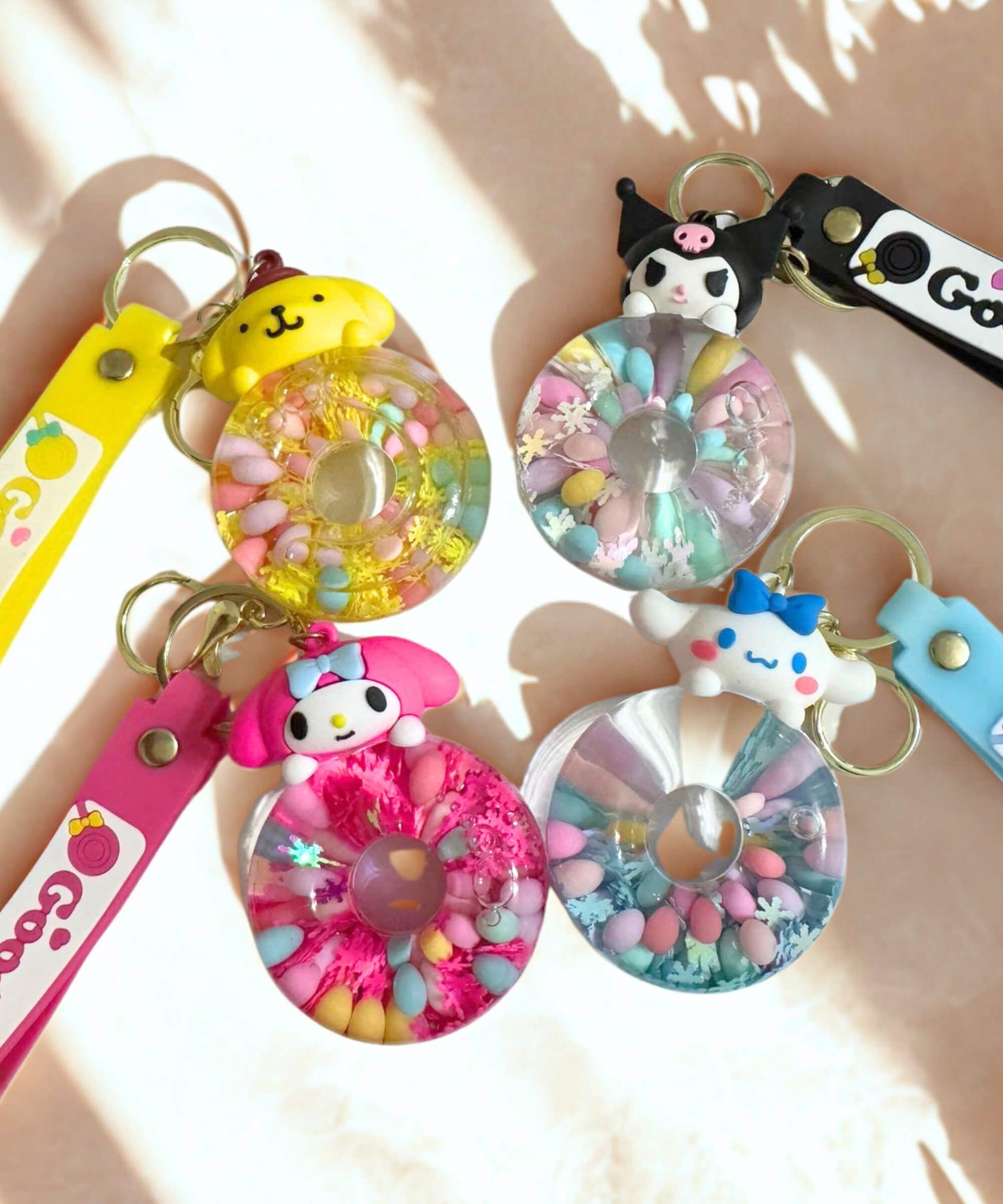 donut liquid keychain floating beads charm colourful cute character bag charm flat lay