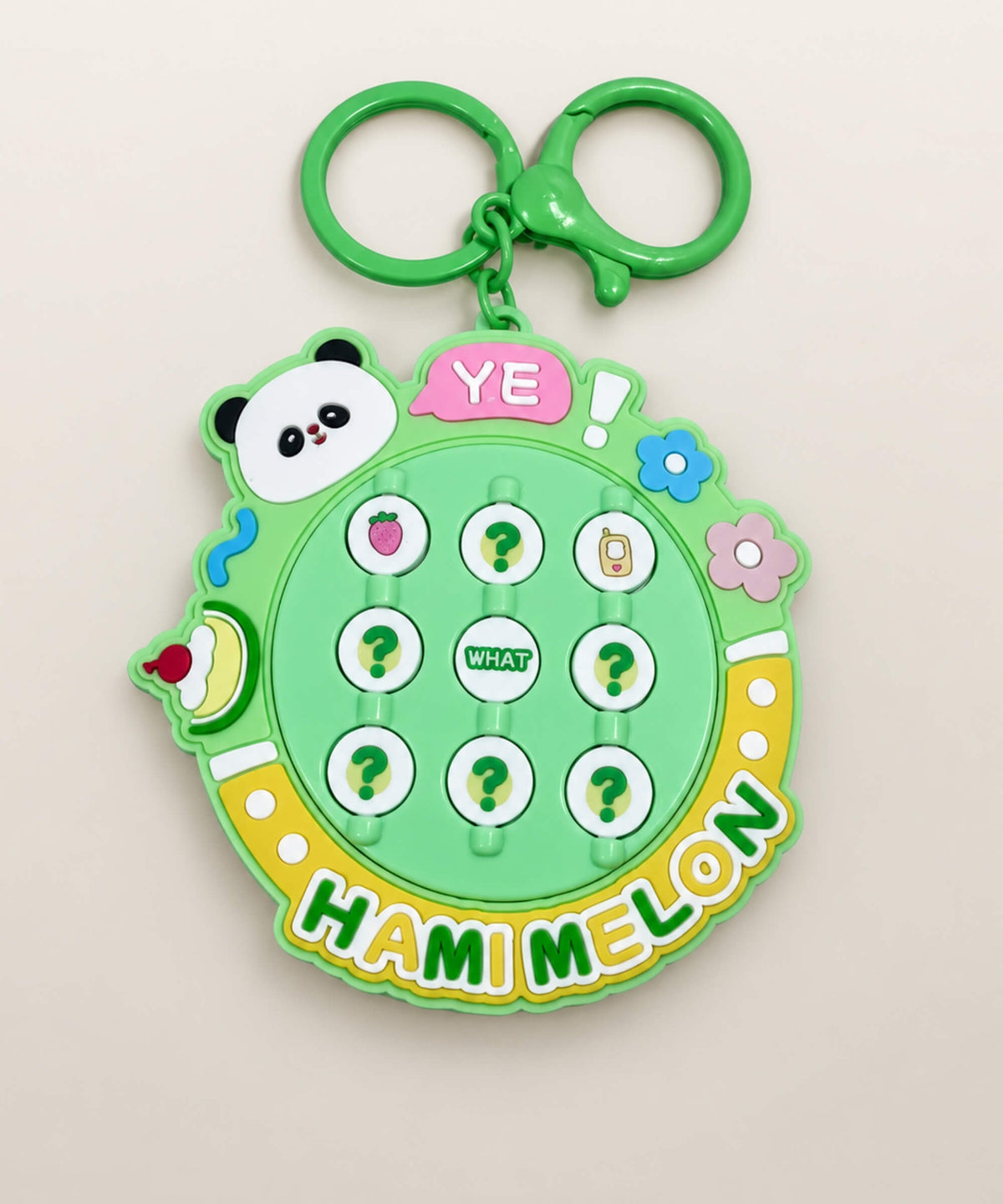 Hami Melon Flip Matching Game Keychain with nine rotating picture tiles