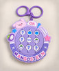 Mangosteen Flip Matching Game Keychain with nine rotating picture tiles