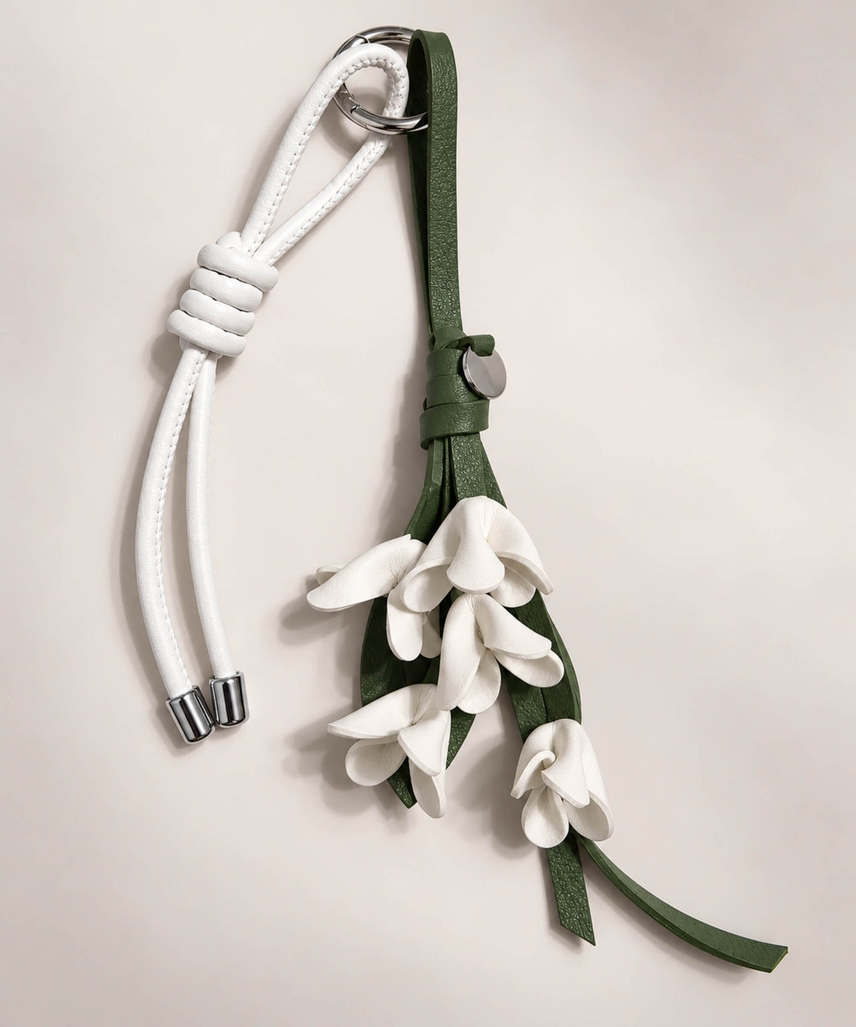 White floral PU leather bag charm keychain with cascading flower details