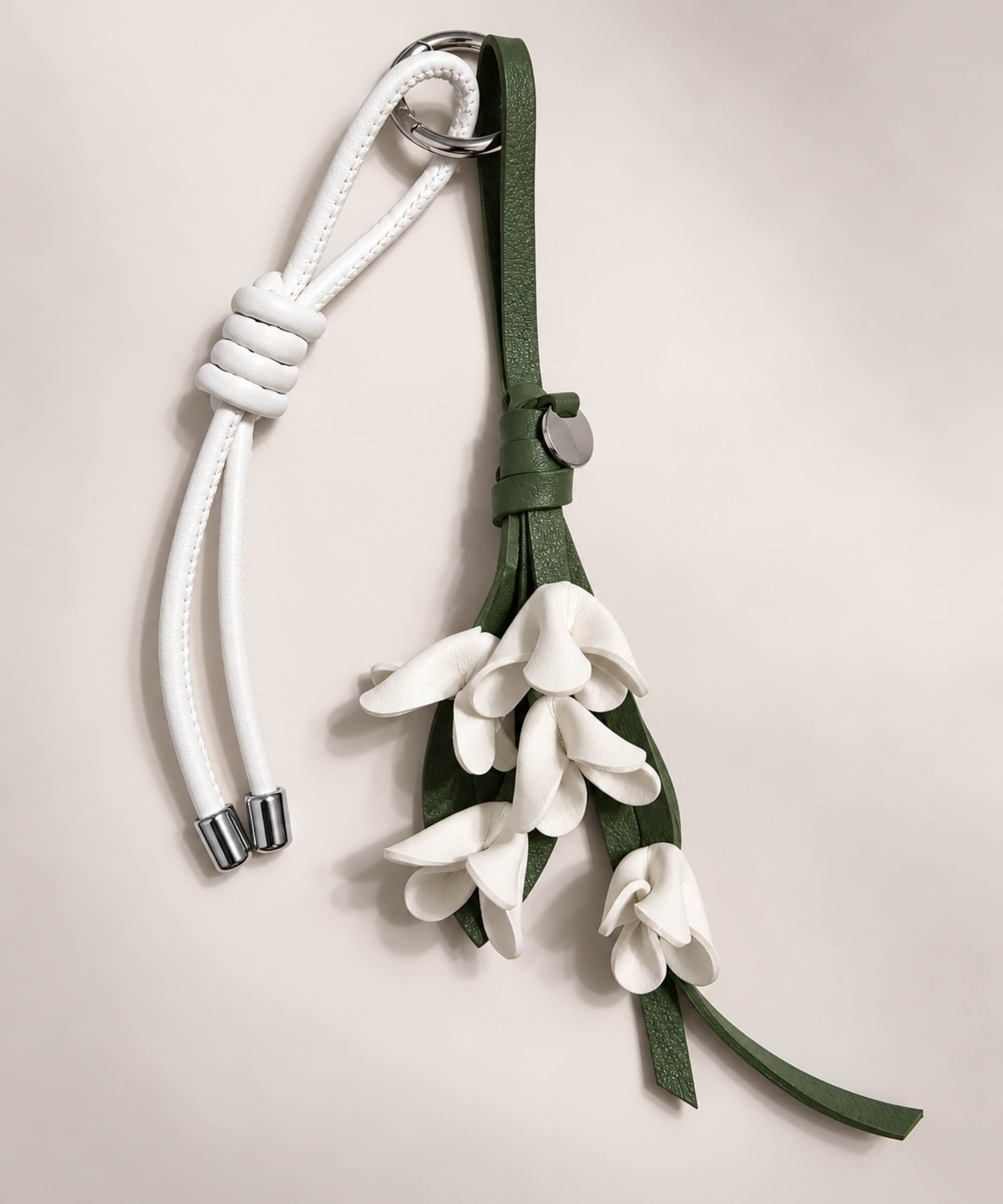 White floral PU leather bag charm keychain with cascading flower details
