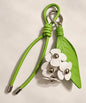 Jasmine PU leather-look bag charm keychain with green leaf and white flower details