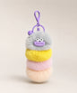 Grey fluffy caterpillar plush keychain with grey, yellow, pink and cream layers