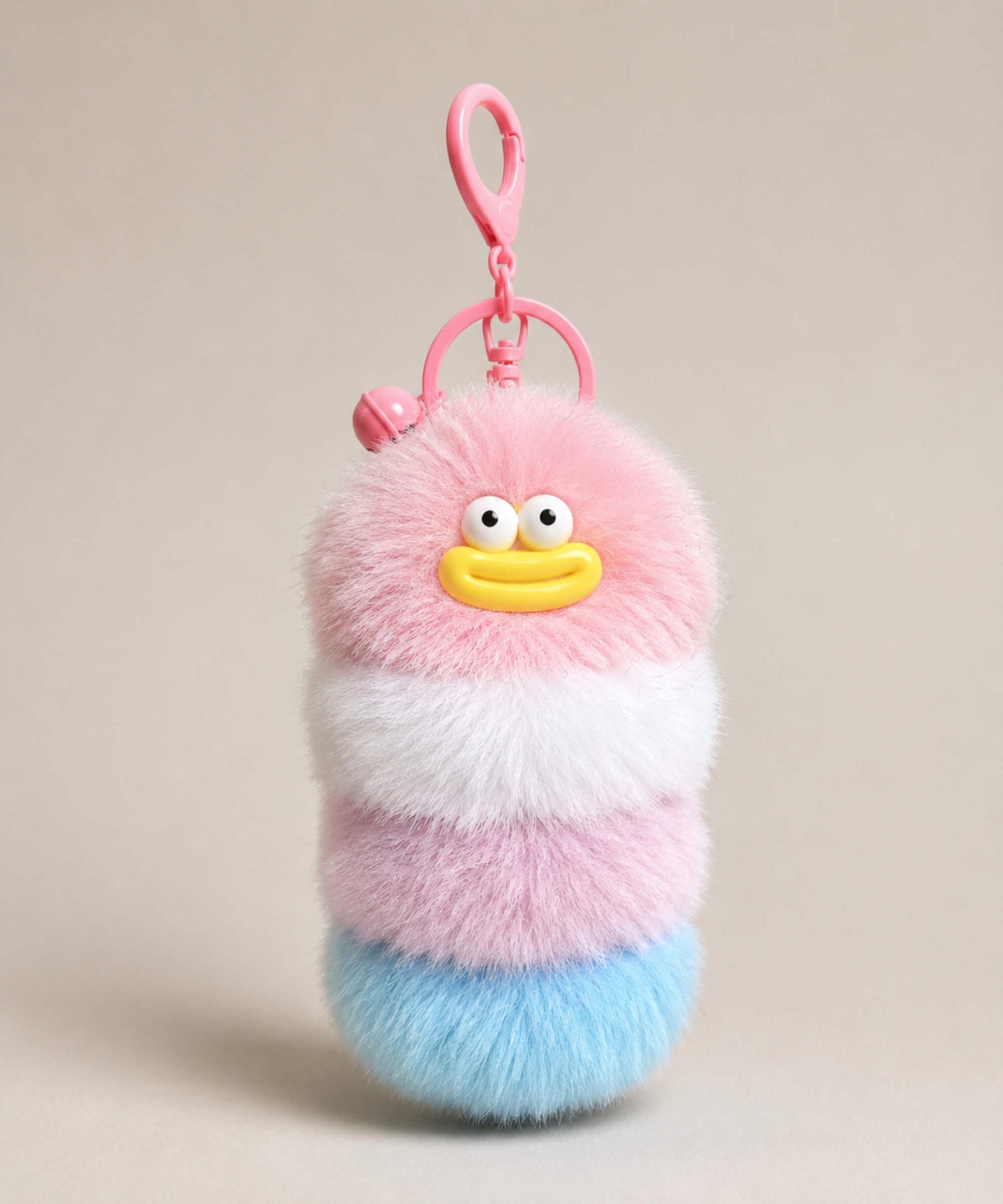 Pink fluffy caterpillar plush keychain with pink, white and light blue layers