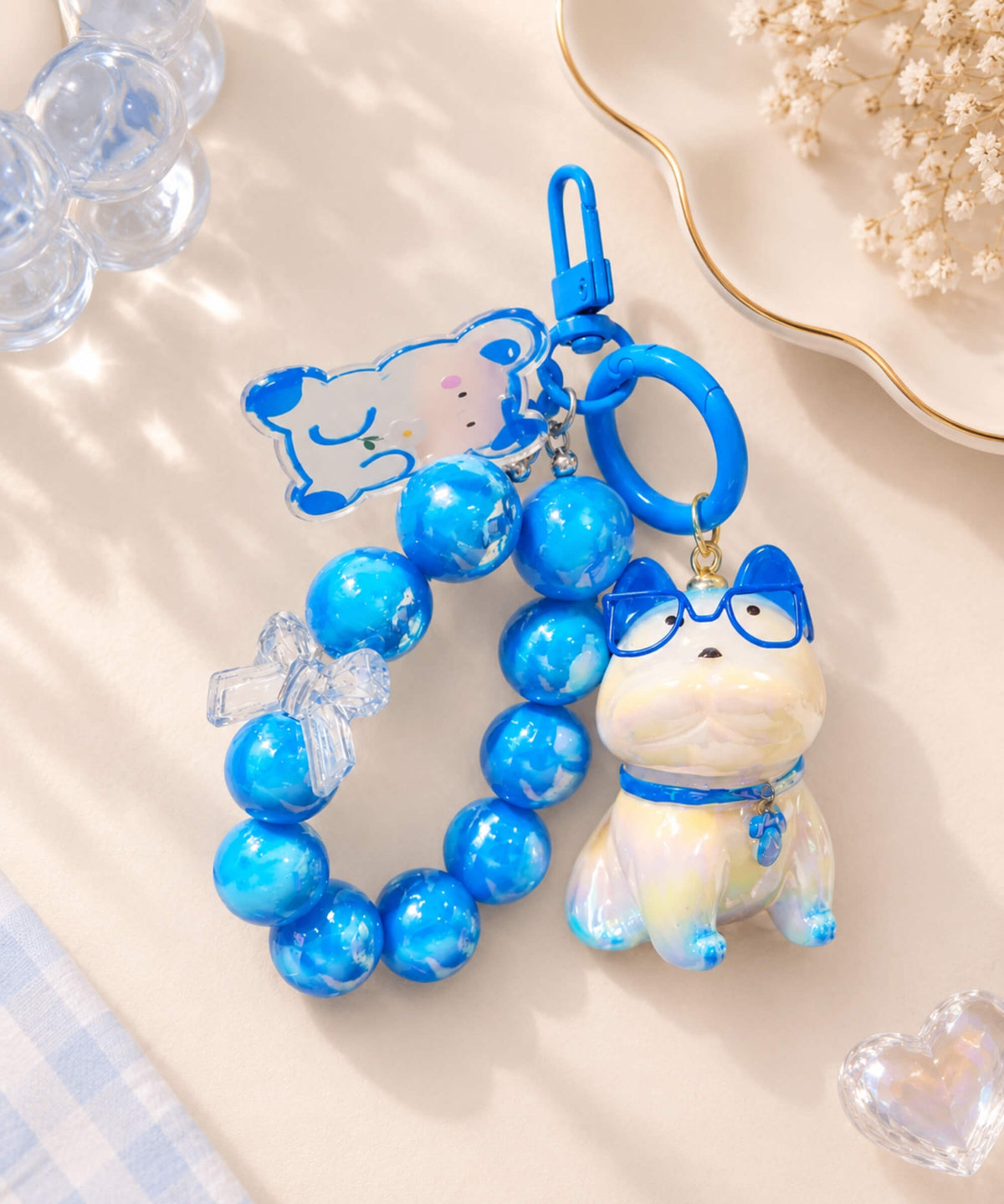 French Bulldog beaded keychain with blue marbled beads, clear bow detail, dog charm and blue keyring