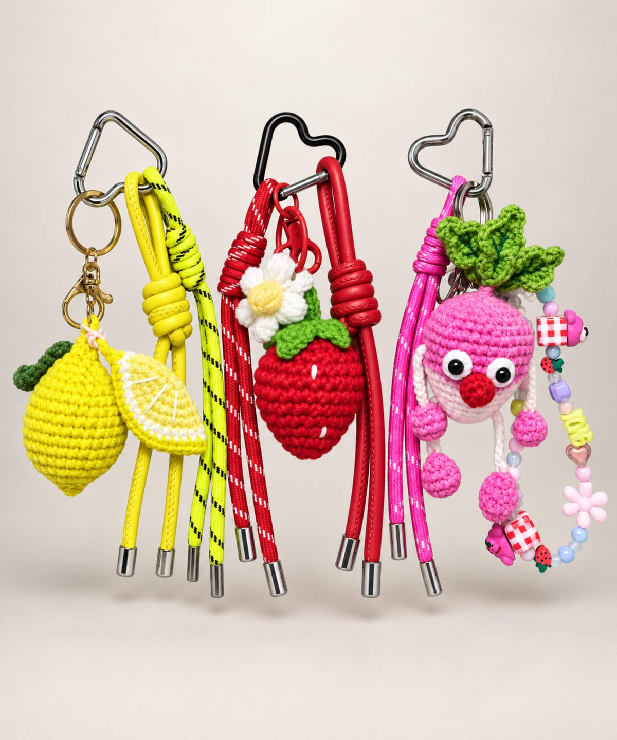 Fruit and veg crochet keychain collection with lemon strawberry and pink radish designs