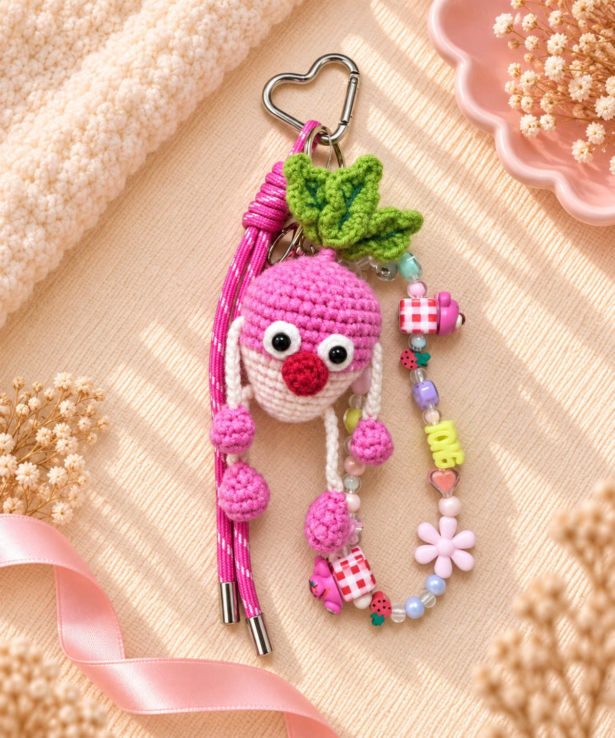 Pink radish fruit and veg crochet keychain with colourful charms and pink hanging cords