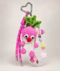 Pink radish fruit and veg crochet keychain with green leaves colourful beads and pink cords