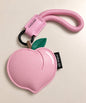 Pink peach PU leather bag charm keychain with green leaf detail