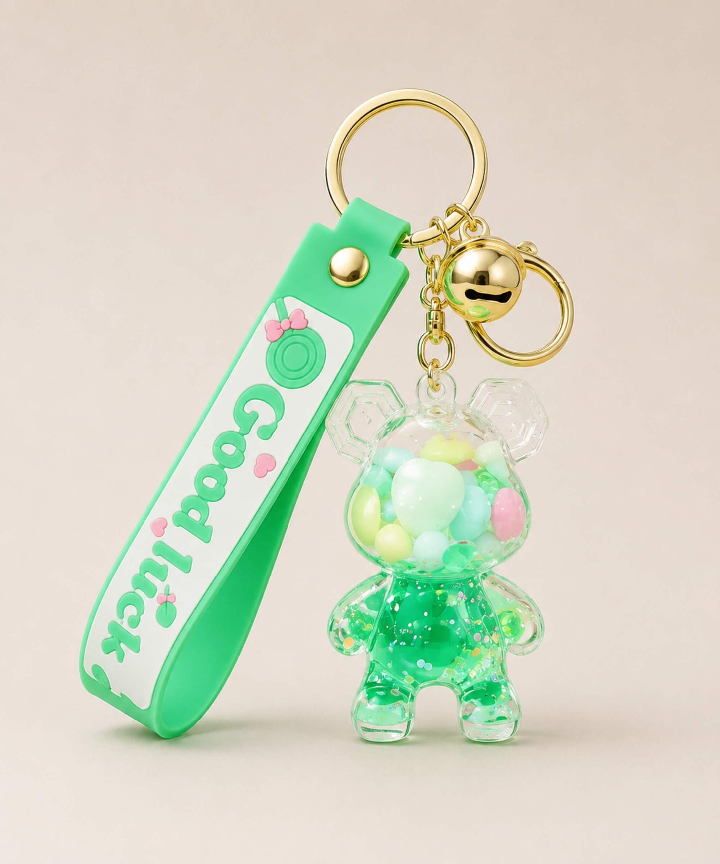 Green bear floating shaker keychain with pastel beads and green strap