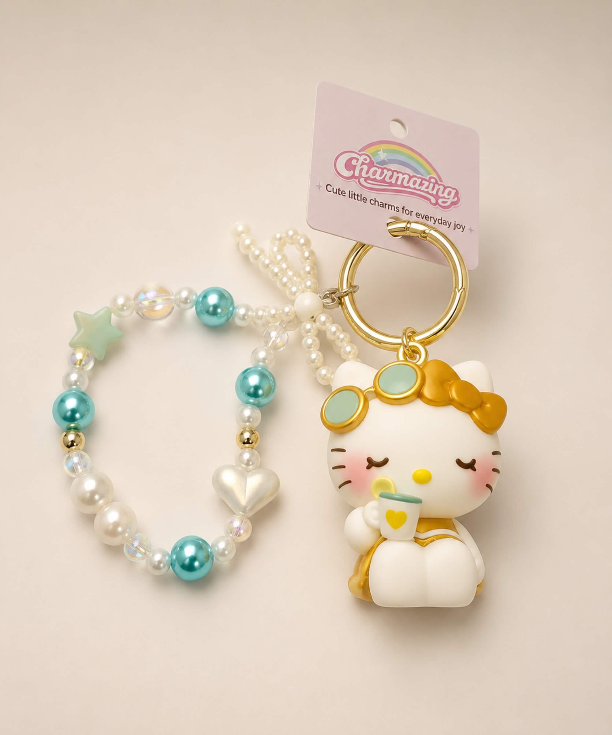 Hello Kitty tea Sanrio beaded keychain with pearl-look beads, teal accents and gold-tone ring