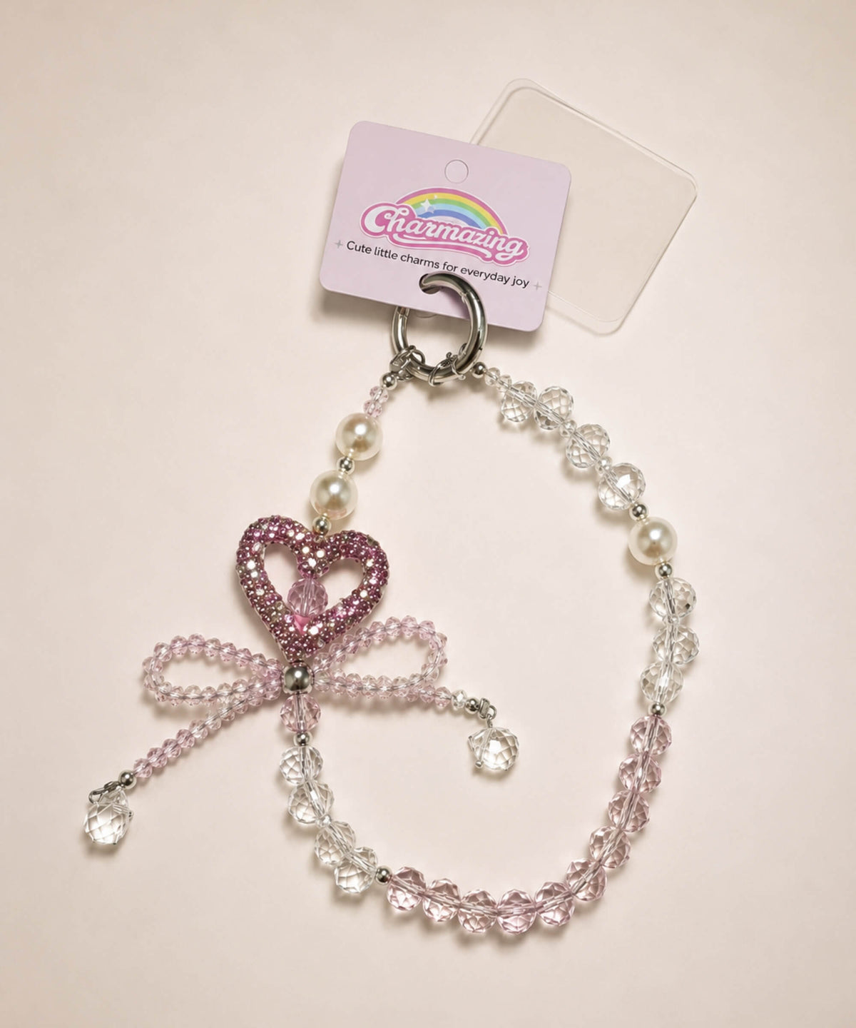 Pink heart bow beaded phone charm with crystal-style beads and sparkling heart detail