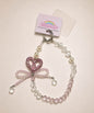 Pink heart bow beaded phone charm with crystal-style beads and sparkling heart detail