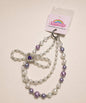Purple heart bow beaded phone charm with pearl-look beads and sparkling heart centrepiece