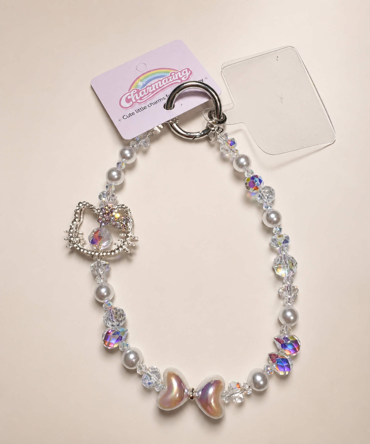 Silver Hello Kitty bow beaded phone charm with pearl-look beads and sparkling crystal-style details