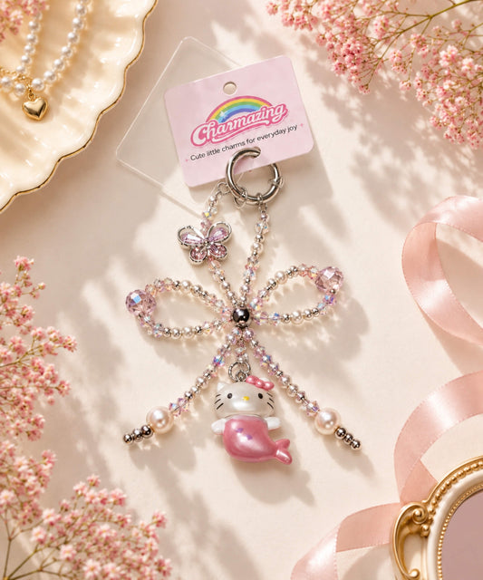 Hello Kitty Mermaid beaded phone charm with pink pearl-look and crystal-style beads in a soft pastel lifestyle setting