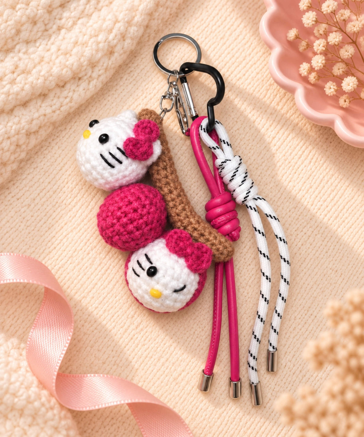 Hello Kitty style tanghulu crochet keychain with pink and white hanging cords