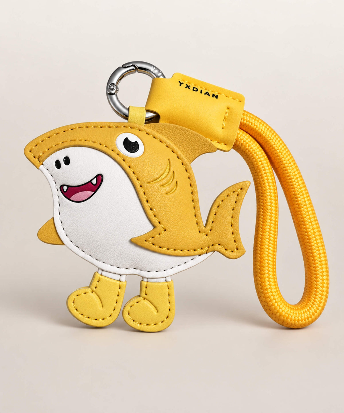 Tralalero Tralala yellow shark PU leather keychain with a matching yellow wrist strap and silver clasp