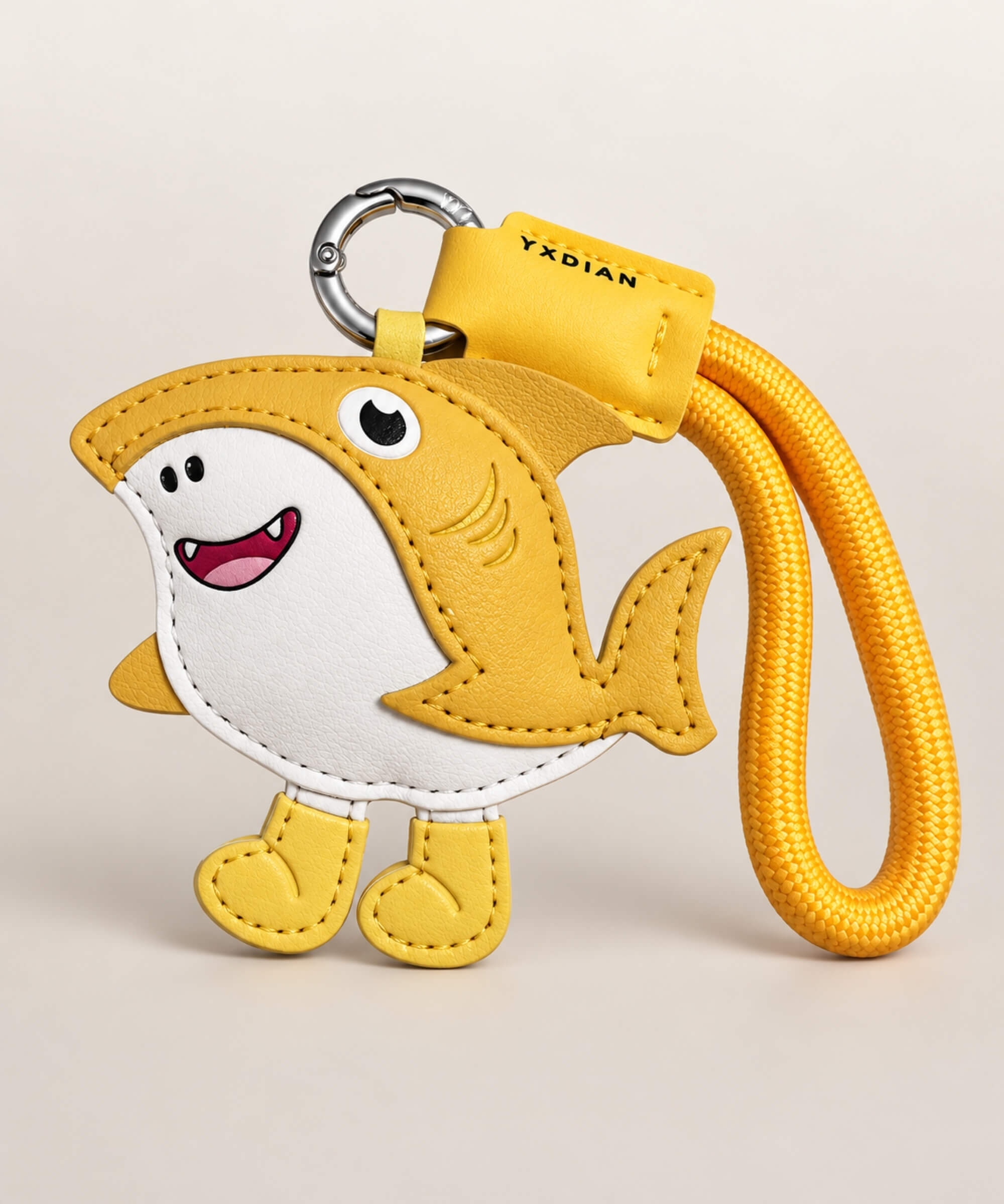 Tralalero Tralala yellow shark PU leather keychain with a matching yellow wrist strap and silver clasp