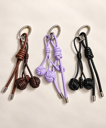 Knotted ball PU leather bag charm keychains in brown purple and black