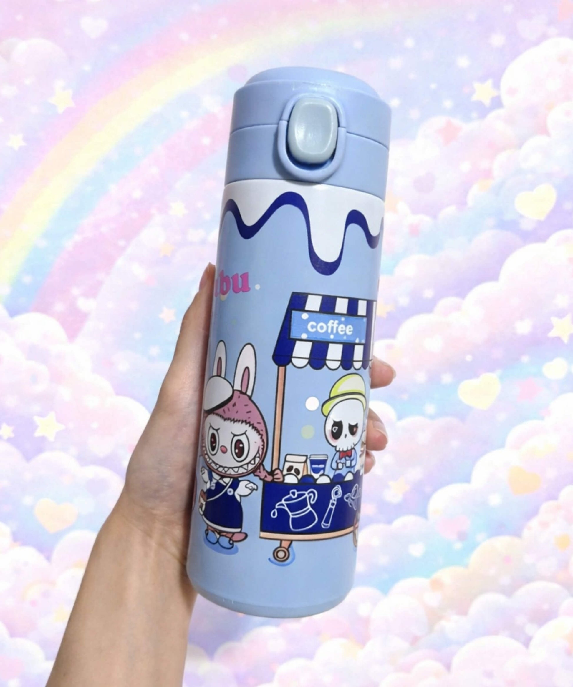 Labubu style insulated water bottle with blue coffee character design held in hand, 420ml stainless steel thermal bottle with pastel background
