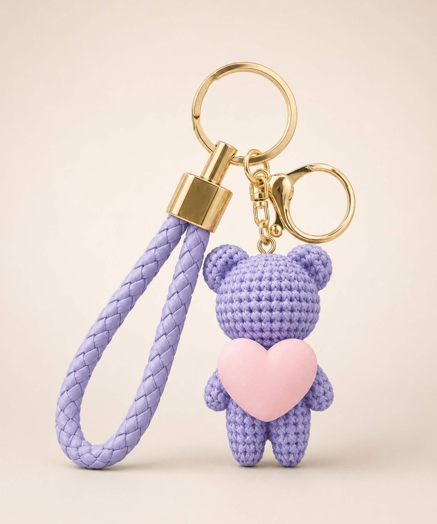 Lavender knitted-look heart bear resin keychain with pink heart detail and matching braided wrist strap