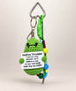 Green Positive Dinosaur crochet keychain holding an encouraging message card