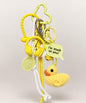 Stuck on You Duck crochet keychain with yellow headphones racket charms and message tag