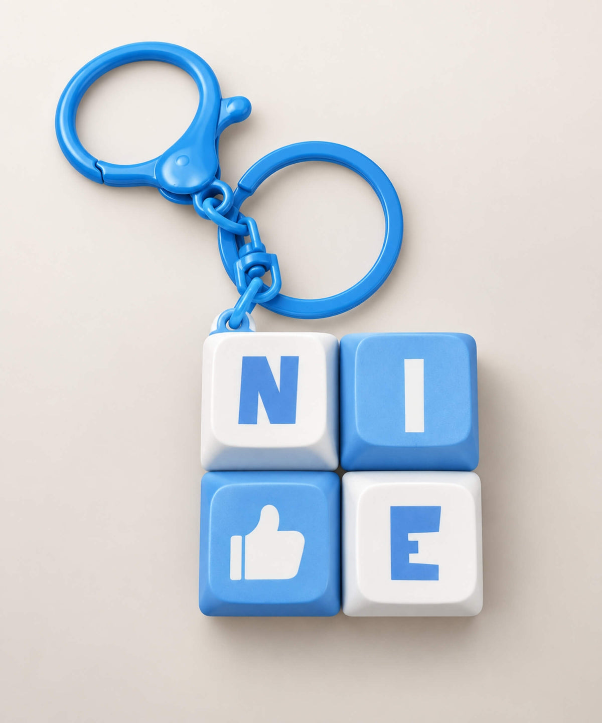 Blue Nice mini keyboard fidget keychain with four pressable keys