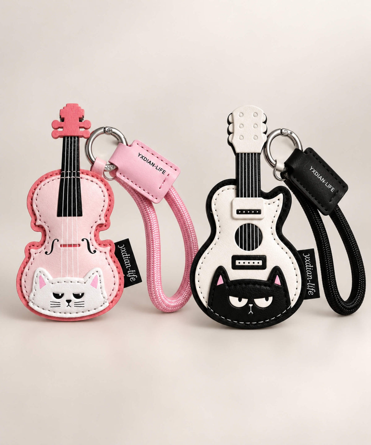 Musical cat PU leather bag charm keychains in Pink Violin Cat and Black Guitar Cat designs