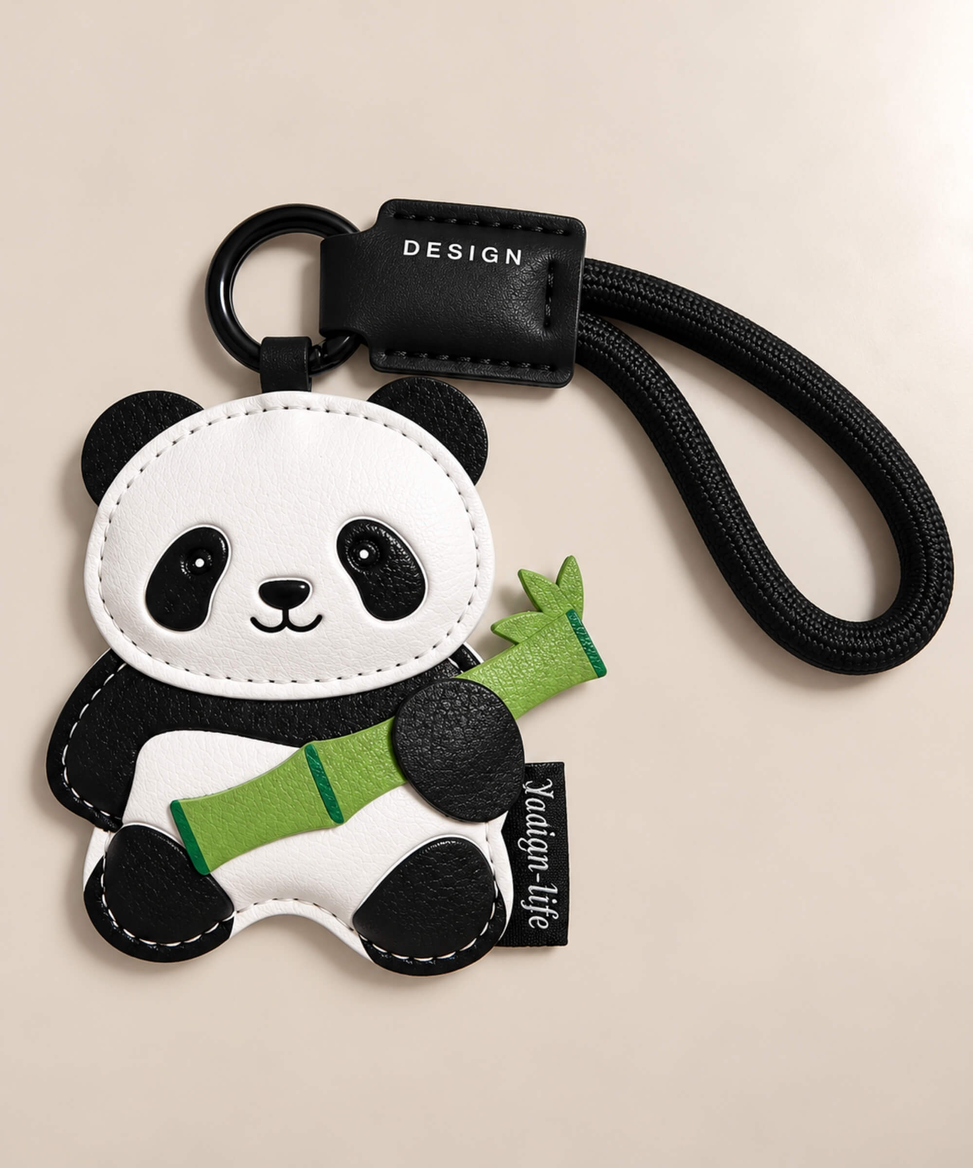 Bamboo Panda PU leather bag charm keychain with green bamboo detail and black wrist loop