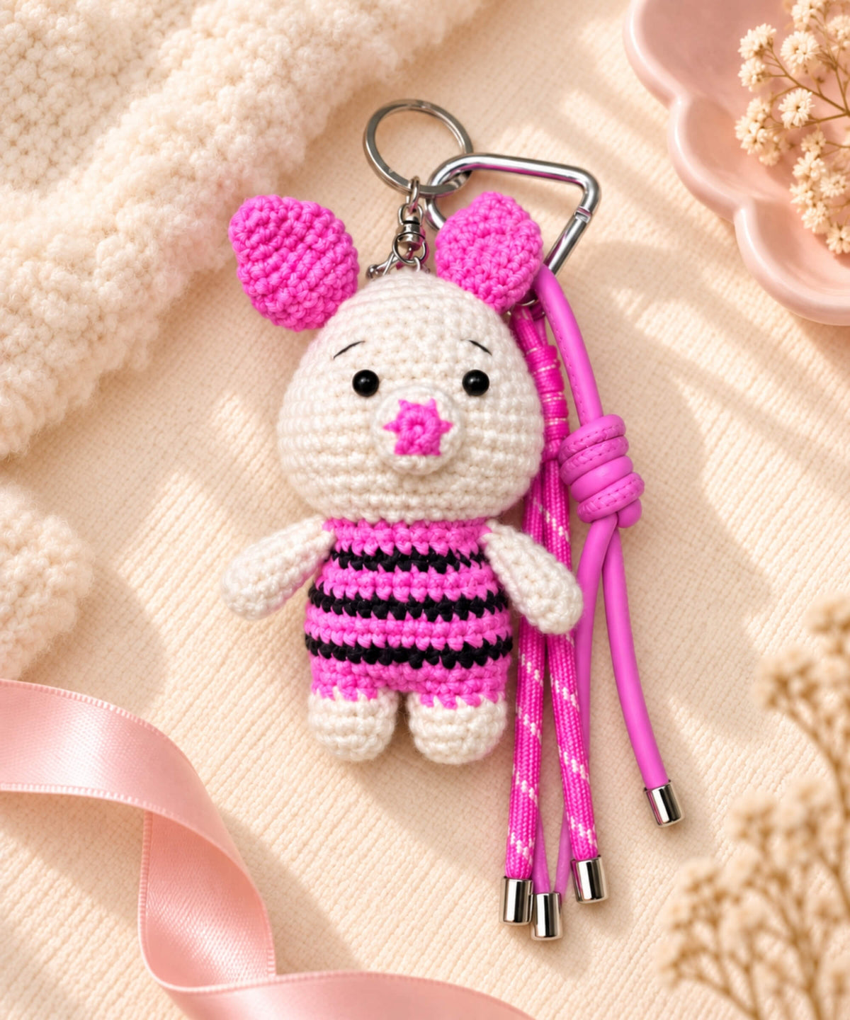 Piglet style crochet keychain with pink strap and metal clip