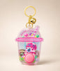 Pink castle water ring game keychain with button and gold bell