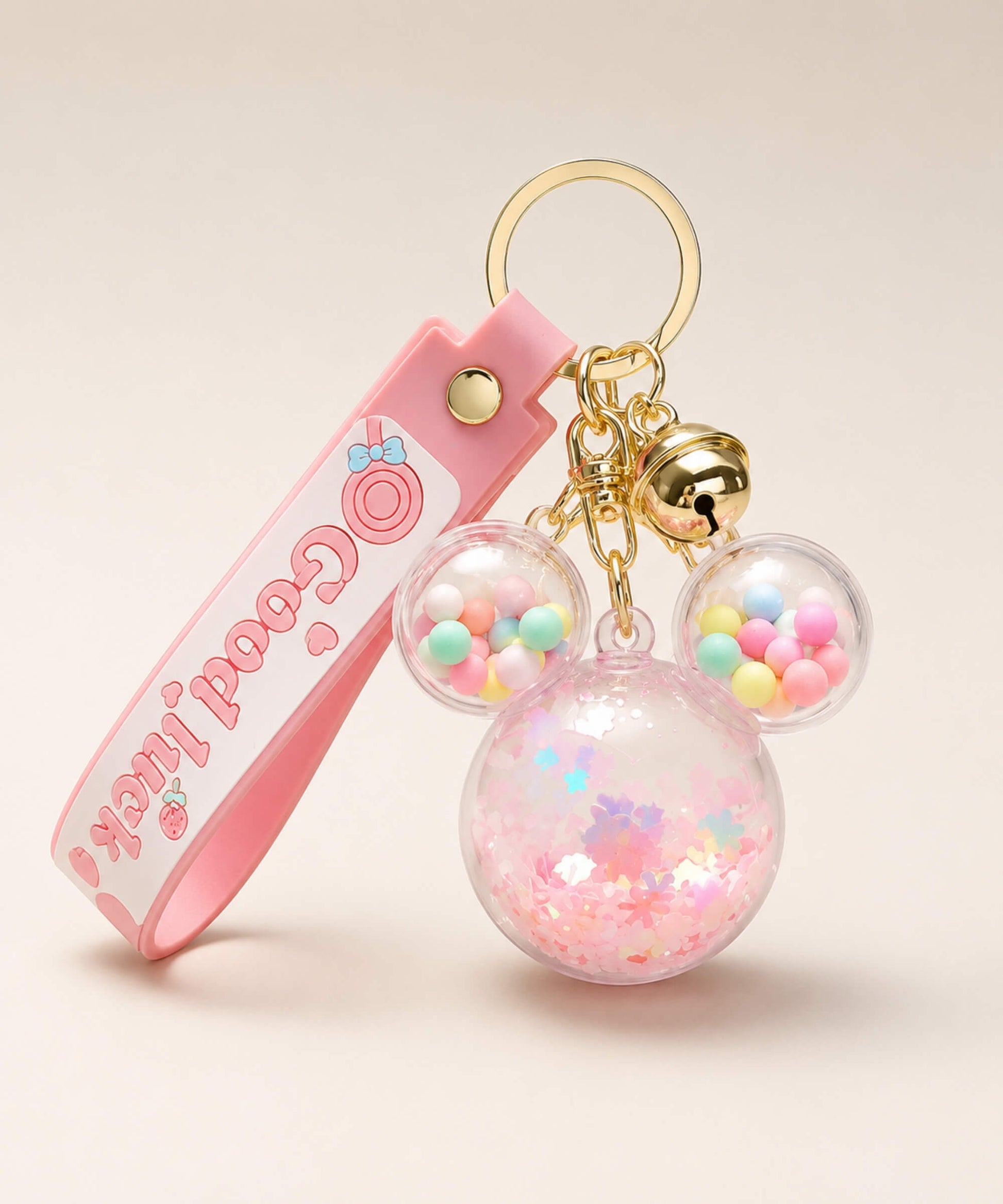 Pink Mickey head floating shaker keychain with pastel beads and gold bell