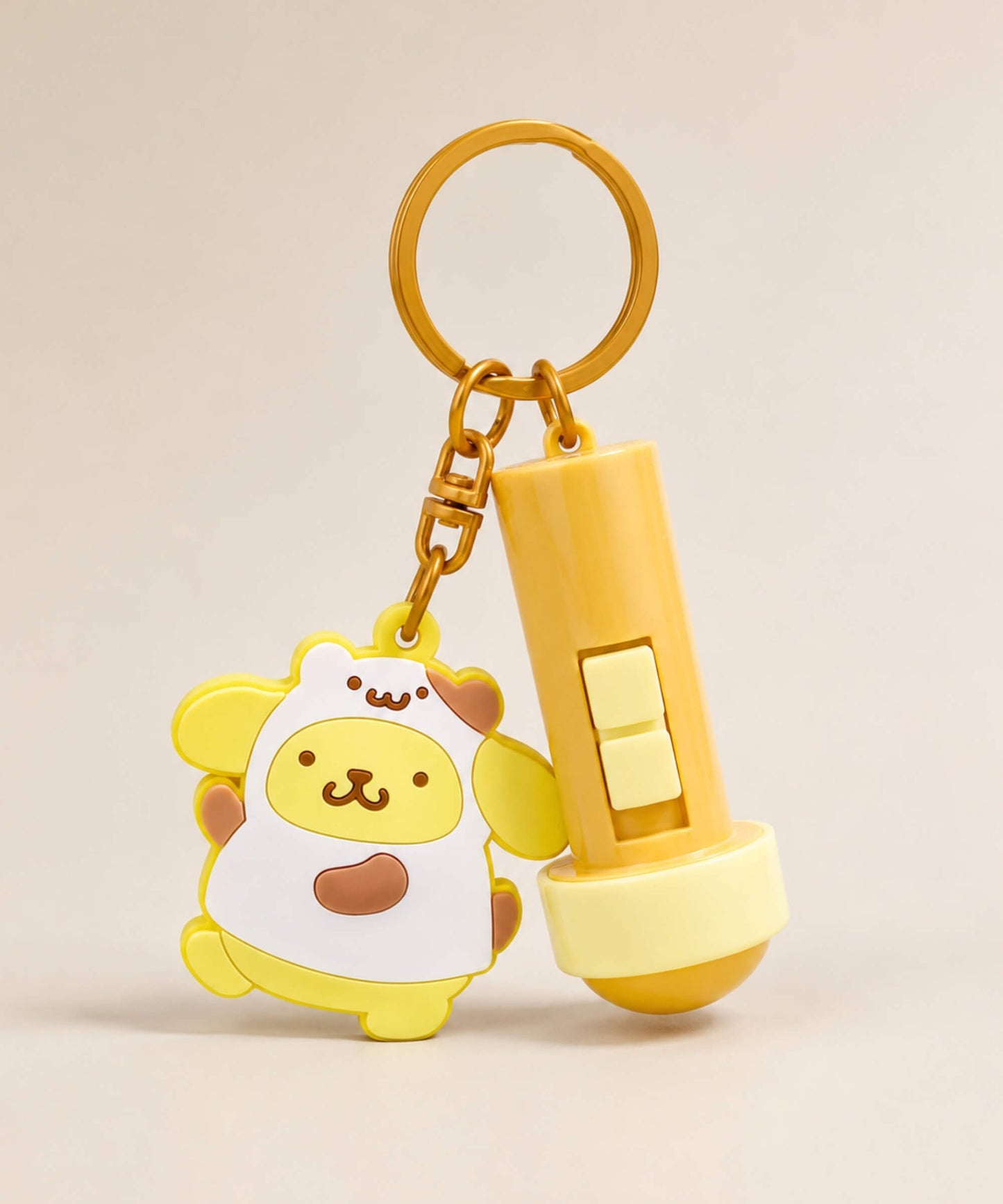 Pompompurin projection light interactive keychain with yellow charm and gold hardware