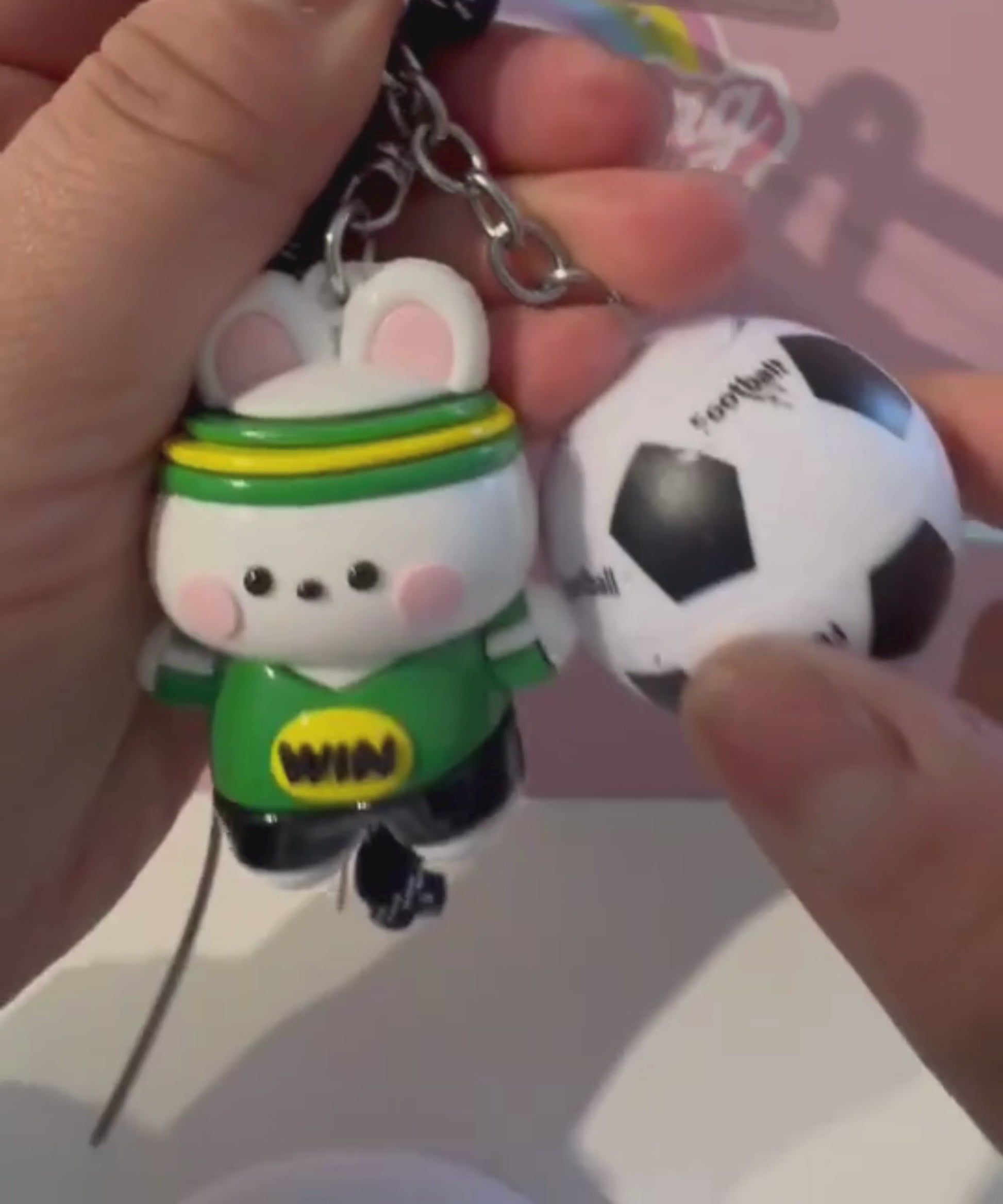 Soccer ball spinner keychain video showing the rotating football detail and cute sports character charm.