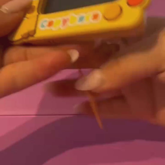 LCD Drawing & Writing Tablet Keychain demonstration showing attached stylus reusable screen and built-in rear stand