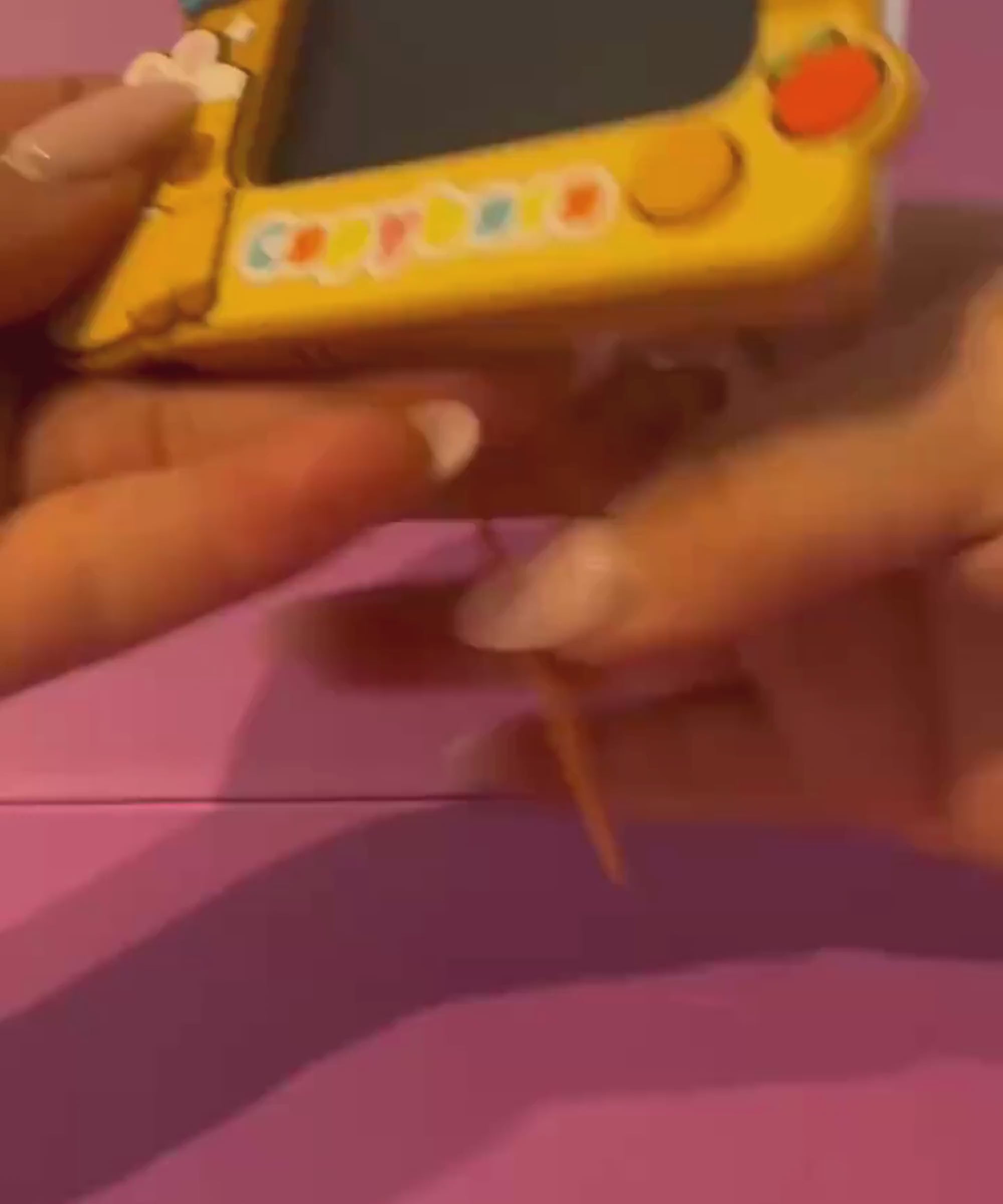 LCD Drawing & Writing Tablet Keychain demonstration showing attached stylus reusable screen and built-in rear stand