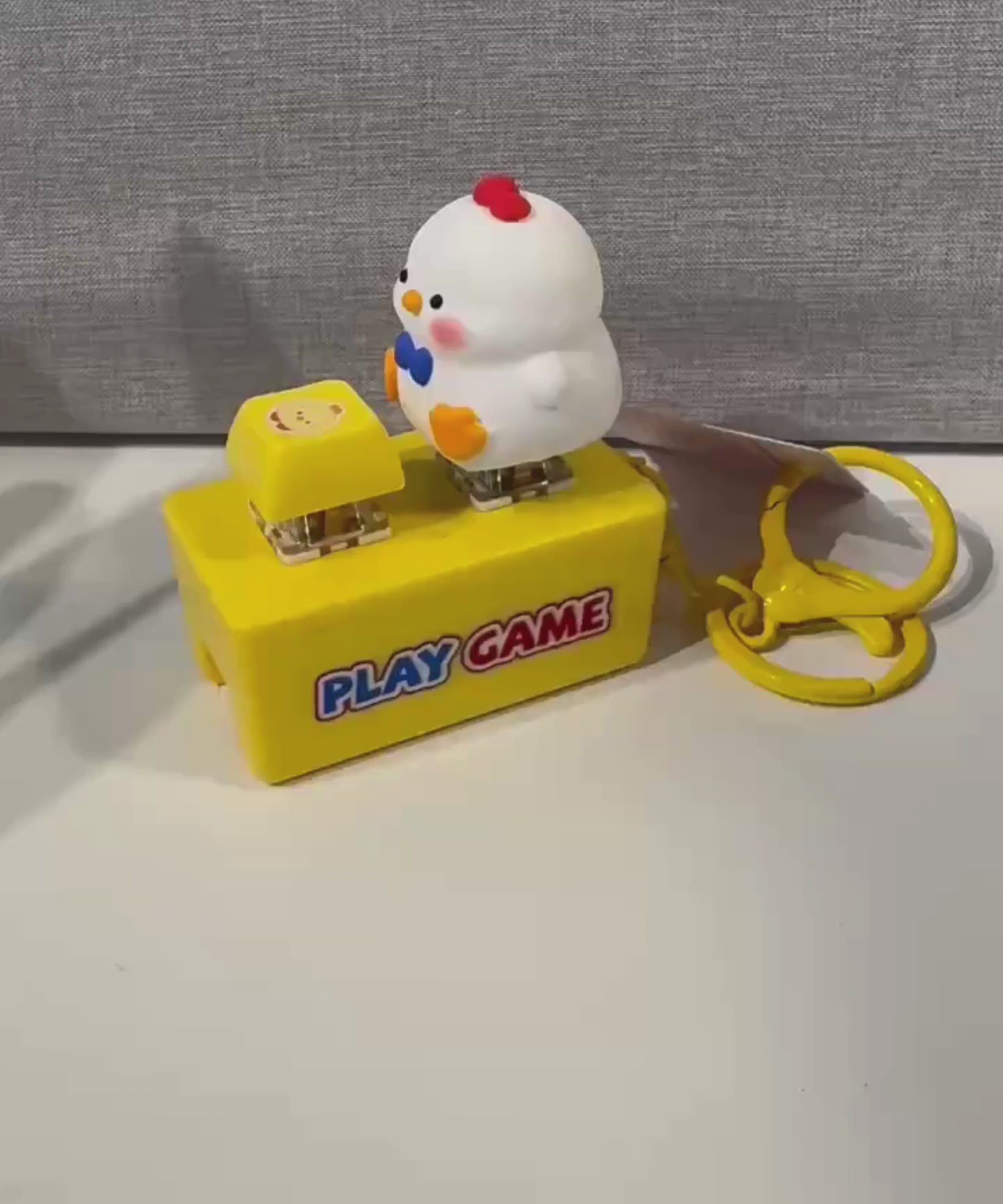 Chick sound and light button keychain interactive feature demonstration
