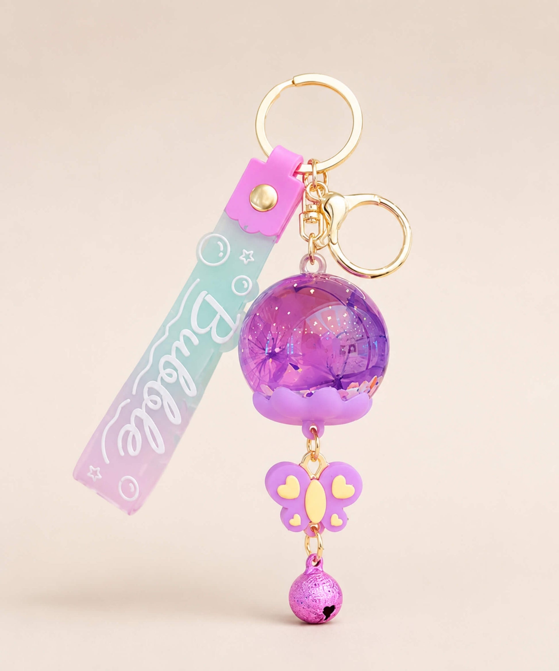 Purple dried flower liquid quicksand keychain with butterfly charm and bell