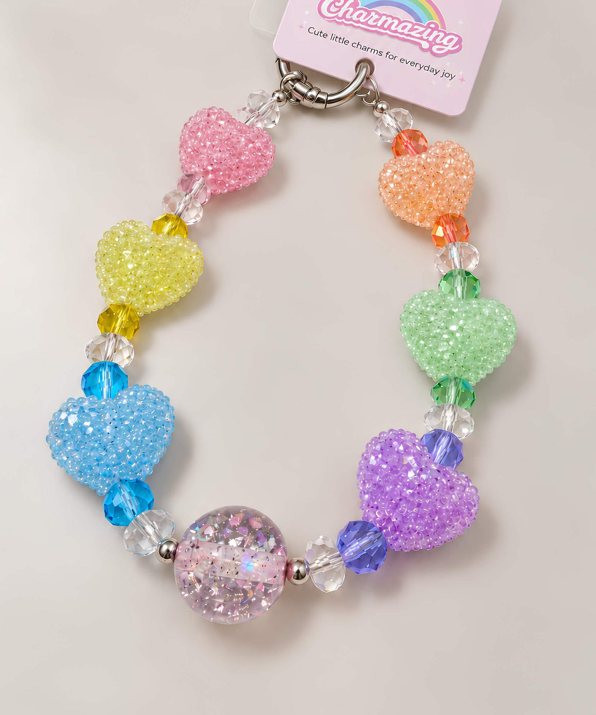 Rainbow heart beaded phone charm with colourful heart beads, crystal-style beads and a glossy feature bead